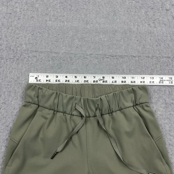 Lululemon On The Fly Pant 27" Women's 2 Green Stretch Drawcord Activewear W5BPNS - Picture 4 of 13